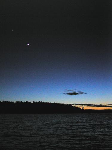 evening view of the moon and stars on the Allagash Wilderness Waterway in northern Maine