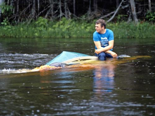 swamped canoe at Allagash Wilderness Waterway