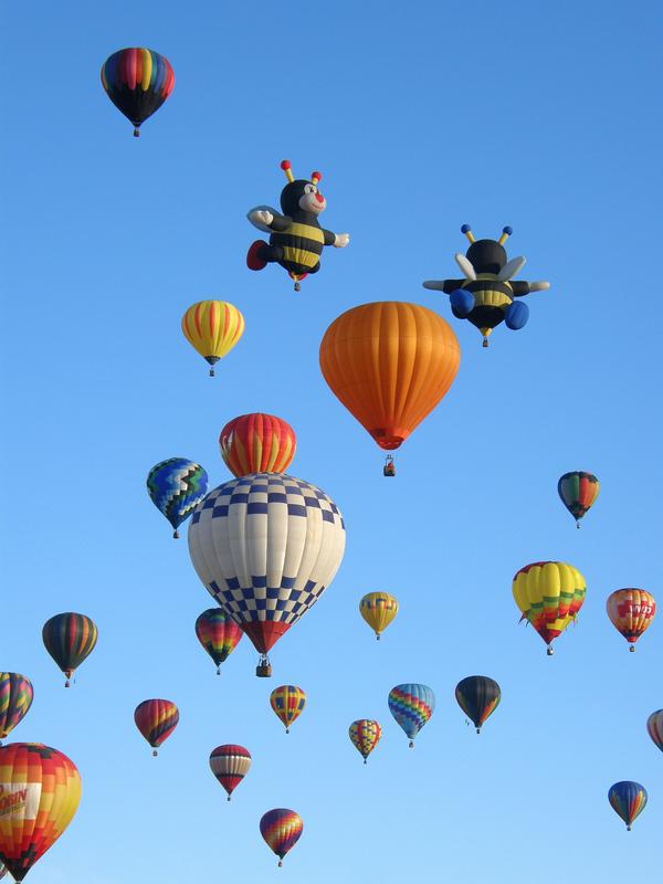 assemblage of balloons (including The Little Bees) at the Albuquerque Balloon Festival in New Mexico