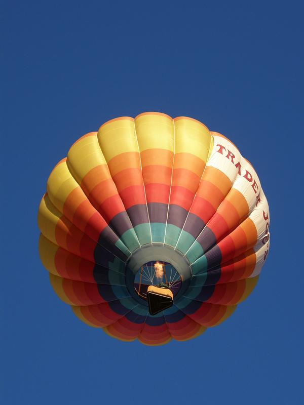 a hot-air balloon rises directly overhead at the Albuquerque Balloon Festival in New Mexico