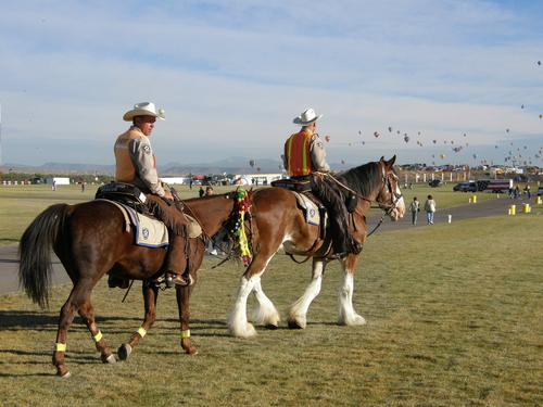 the local sheriffs form a mounted search-and-rescue squad at the Albuquerque Balloon Festival in New Mexico