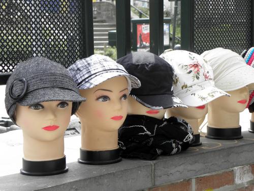 hats on display outside a store at Brussels in Belgium