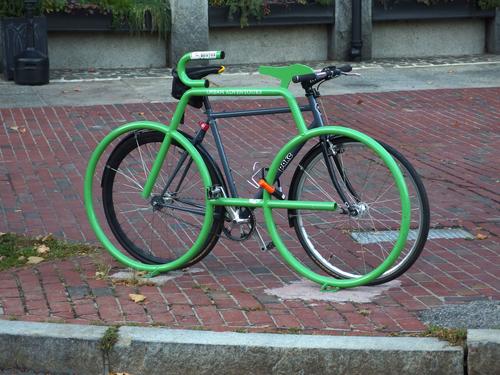 Urban Adventours bike and bike-shaped bike rack on a Boston street