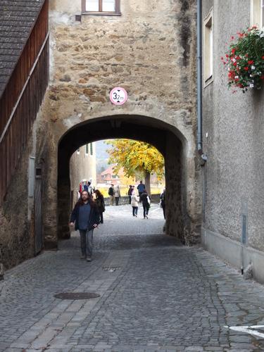 view down-street toward the Danube River from within the medieval town of Durnstein in Austria