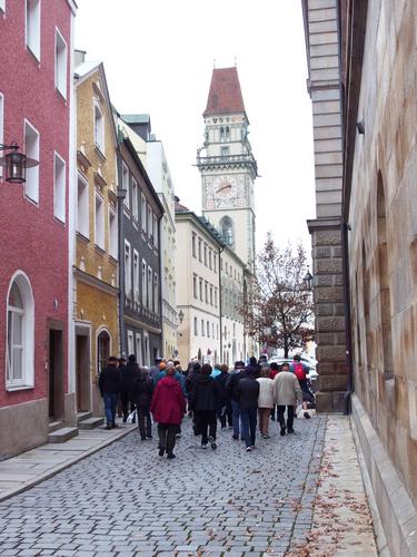 a tour group from the Viking Legend cruise ship heads up-street at Passau in Germany