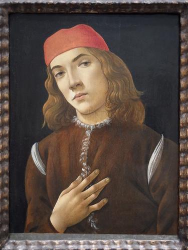 Portrait of a Youth by Sandro Botticelli on display inside the West Wing of the National Gallery of Art in Washington DC