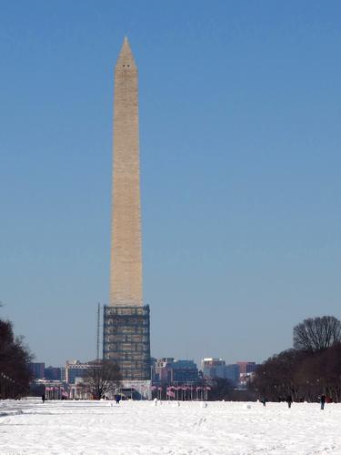 winter view of the Washington Monument with repair scaffolding at the National Mall in Washington DC