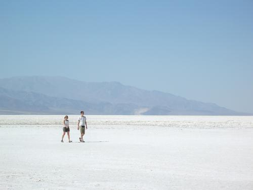 tourists walking 282 feet below sea level at the Badwater Basin of Death Valley National Park in California