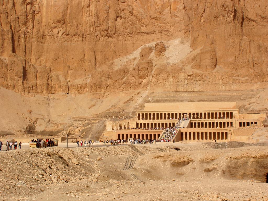 tourists swarm like ants over the three levels of Hatshepsut's Temple in Egypt