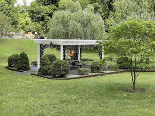 gazebo and picnic table in July at Mt Albion Cemetery in Albion, New York