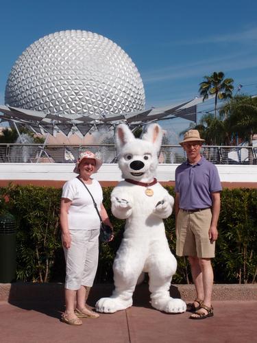 Betty Lou and Fred posing with super-dog Bolt at Disney's EPCOT park in Florida