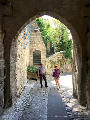 David and Andee at an roadway arch at Provence in France