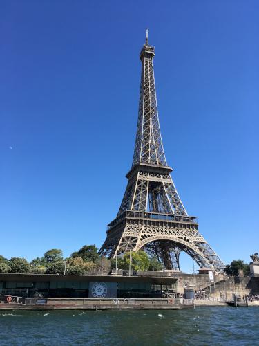 view of the Eiffel Tower from the water bus in Paris, France