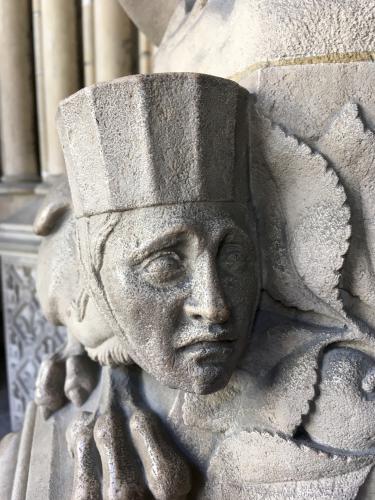 weird creature decorating a column at Sainte-Chapelle in Paris, France
