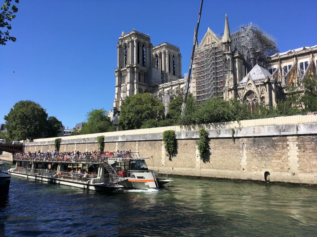 view of Notre Dame from across the river in Paris, France