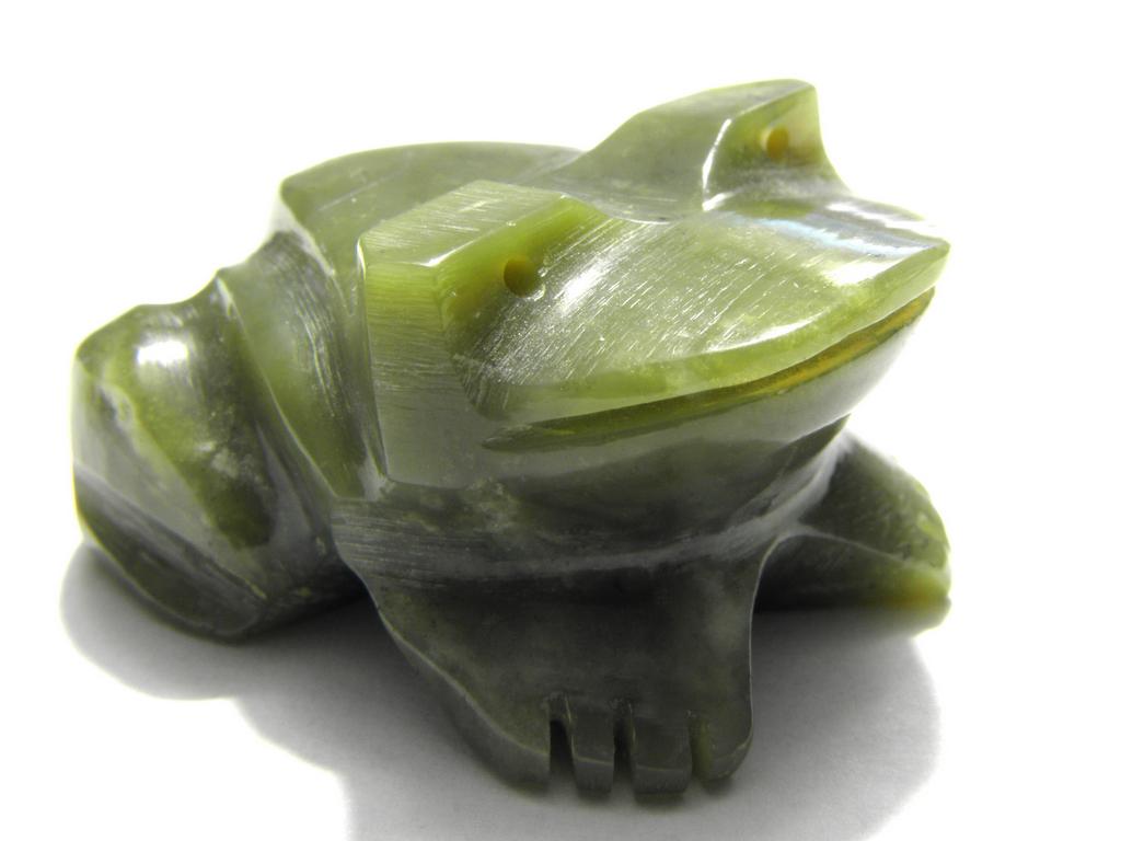 carved stone frog