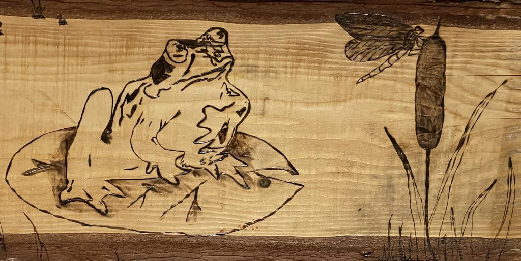 carved wood frog
