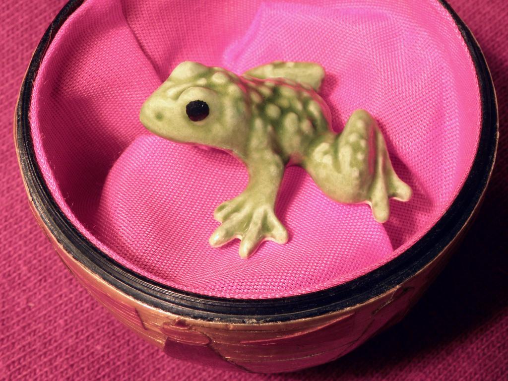 frog in a Christmas ornament