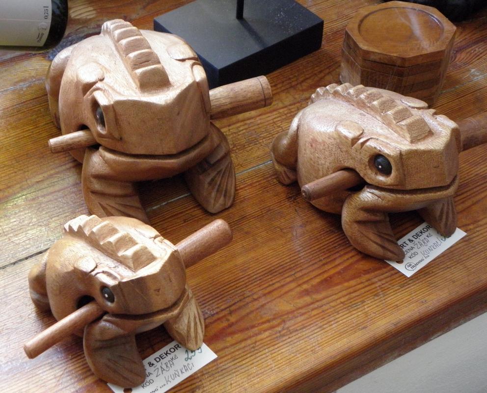 trio of wooden frogs