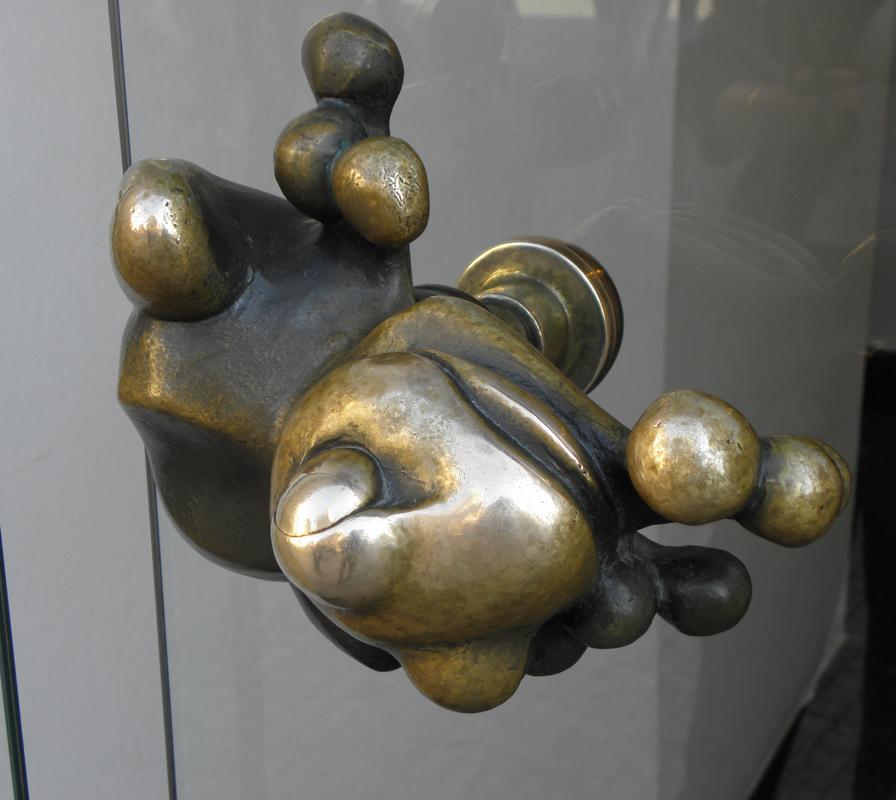 brass doorknob frog