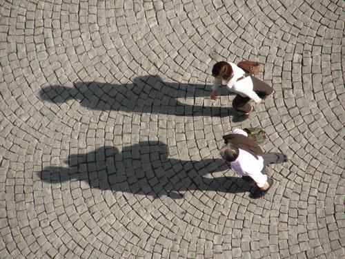 downward view from Thomaskirche's bell tower of plaza strollers at Leipzig in Germany