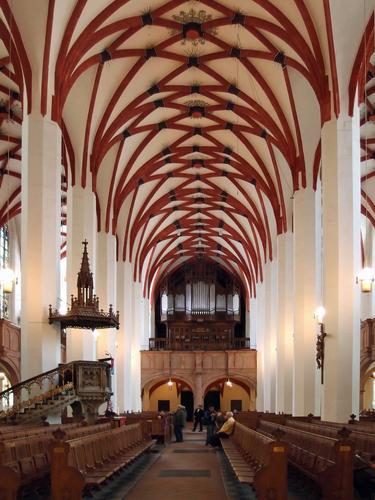 view looking backward from the altar of the interior of St Thomas Church at Leipzig in Germany