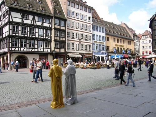 statue mimes performing outside Strasbourg Cathedral in France near the border with west Germany