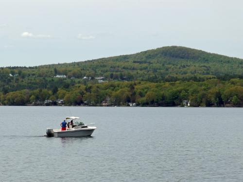 boat in May on Winnisquam Lake near Ahern State Park in New Hampshire