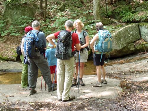 hikers at Gerry Falls on the trail to Mount Ascutney in Vermont