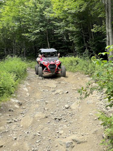 rocky trail in July on ATV hikes near Pittsburg in northern New Hampshire