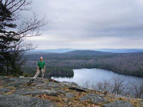 hiker at the viewpoint on the trail to Bald Mountain