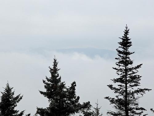 a stormy-weather peek at the view from Bald Mountain in New Hampshrie