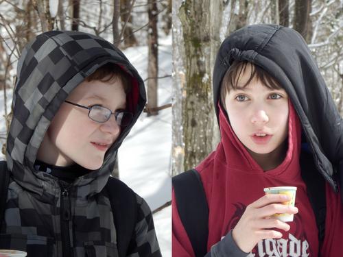 winter hikers take a cocoa break on the way to Bald Rock on Mount Monadnock in New Hampshire