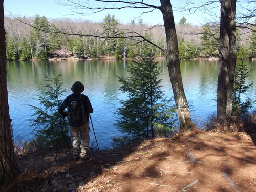 Dick takes in the view of Forest Pond on the way to Bean Hill in New Hampshire