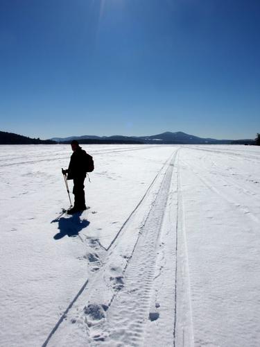 John stands out in February on Lake Winnipesaukee in New Hampshire as we walk-on-water over to Bear Island