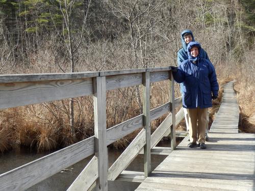 visitors on Bouchard Bridge at Beaver Brook in New Hampshire