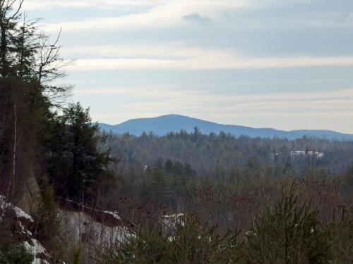 view in March of a nearby mountain from Bell Ledges in southern New Hampshire