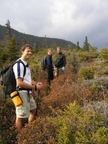 hikers on the unofficial trail to Mount Bemis in New Hampshire