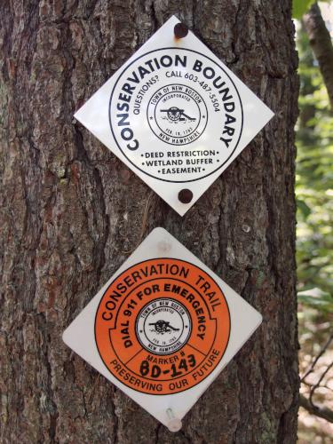 trail signs at Betsey Dodge Conservation Area in southern New Hampshire
