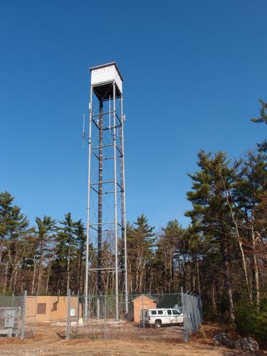 near-summit cell tower faked to look like a fire lookout tower on Birch Hill in southern New Hampshire
