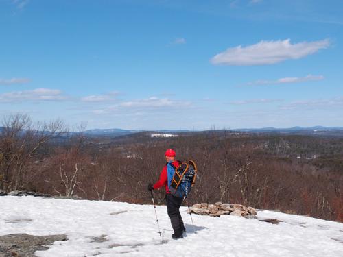 hiker at the viewpoint on Blood Hill in Massachusetts