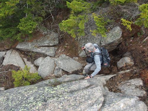 Dick heads down a scarily steep section of the Carter Ledge Trail near Blue Mountain in the White Mountains of New Hampshire