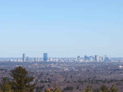view of the Boston skyline looking north from Eliot Tower on Great Blue Hill at Blue Hills Reservation in Massachusetts