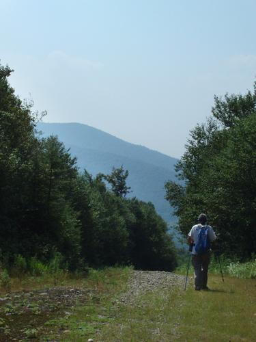 hiker on the way to North Blue Mountain in New Hampshire