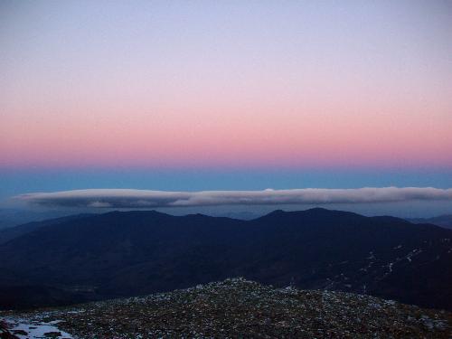 sunset glow over Wildcat Ridge in November as seen from Boott Spur in New Hampshire