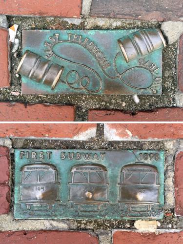 sidewalk bricks advertising Boston historical development near Long Wharf in Massachusetts