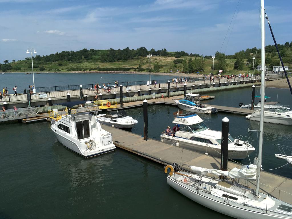 visitors exit the cruise boat at the Spectacle Island dock at Boston Harbor in Massachusetts