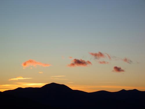 sunset over Mount Passaconaway as seen from the Boulder Loop Trail upper outlook in New Hampshire