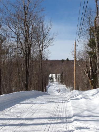 late-winter view of Bridgewater Hill Road near Bridgewater Mountain in New Hampshire