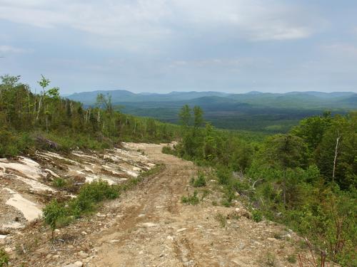 view west toward New Hampshire's northern White Mountains as seen from the service road to Cambridge Black Mountain in New Hampshire